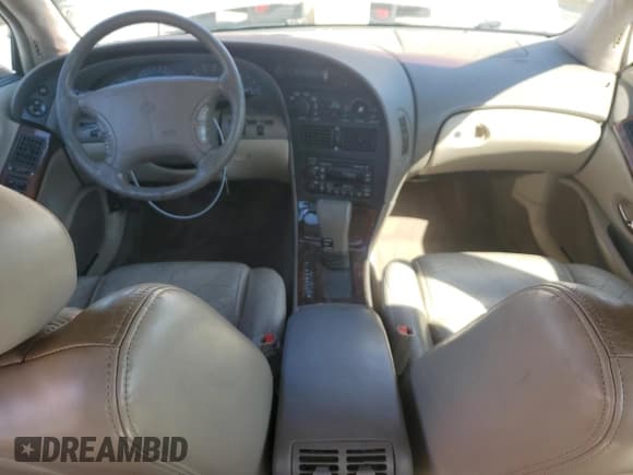 ✅ 1999 Oldsmobile Aurora • VIN: 1G3GR62C3X4104080 • Lot: 83846835. Listed on Copart with 139,854 mi. Free auction sales archive from the USA and detailed vehicle history report at DreamBid. Image 8.