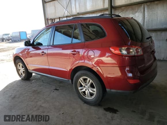 ✅ 2012 Hyundai Santa Fe GLS • VIN: 5XYZGDAB0CG124567 • Lot: 80482164. Listed on Copart with 249,148 mi. Free auction sales archive from the USA and detailed vehicle history report at DreamBid. Image 2.