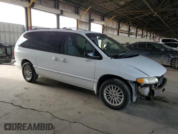 ✅ 2000 Chrysler Town & Country LX • VIN: 1C4GP44G1YB695954 • Lot: 81362815. Listed on Copart with 185,155 mi. Free auction sales archive from the USA and detailed vehicle history report at DreamBid. Image 4.
