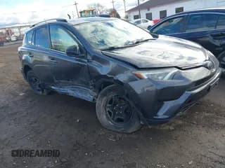 ✅ 2018 Toyota RAV4 LE • VIN: JTMBFREV8JJ729942 • Lot: 43557394. Listed on IAAI with 108,053 mi. Free auction sales archive from the USA and detailed vehicle history report at DreamBid. Image 1.