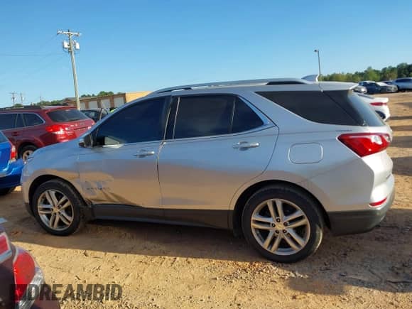 2018 Chevrolet Equinox Premier z VIN 3GNAXNEX5JS509702, wystawiony jako IAAI lot #43364923 z przebiegiem 152 731 mil mil oraz . Historia ofert i sprzedaży dostępna na DreamBid. Obrazek 14.