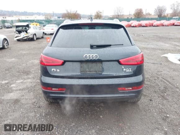 ✅ 2015 Audi Q3 Premium Plus • VIN: WA1EFCFS6FR009282 • Lot: 43742001. Listed on IAAI with 116,020 mi. Free auction sales archive from the USA and detailed vehicle history report at DreamBid. Image 16.