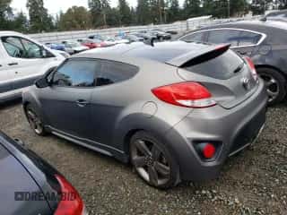 2015 Hyundai Veloster Turbo z VIN KMHTC6AEXFU237769, wystawiony jako Copart lot #84004975 z przebiegiem 98 923 mil mil oraz Czysty tytuł • Clean title. Historia ofert i sprzedaży dostępna na DreamBid. Obrazek 2.