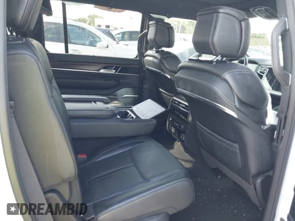 ✅ 2023 Jeep Grand Wagoneer • VIN: 1C4SJVEJ7PS570435 • Лот: 42289466. Опубликован ранее на IAAI с пробегом Не указан. Бесплатный доступ к архиву аукционных продаж из США и подробный отчёт об истории автомобиля на DreamBid. Изображение 8.