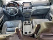 ✅ 2006 Honda Odyssey EX-L • VIN: 5FNRL38776B070297 • Лот: 95570655. Опубликован ранее на Copart с пробегом 124 763 миль. Бесплатный доступ к архиву аукционных продаж из США и подробный отчёт об истории автомобиля на DreamBid. Изображение 8.