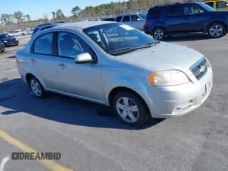 2007 Chevrolet Aveo LS z VIN KL1TD56657B150282, wystawiony jako IAAI lot #41416393 z przebiegiem 74 809 mil mil oraz . Historia ofert i sprzedaży dostępna na DreamBid. Obrazek 1.