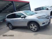 ✅ 2018 Honda Pilot EX-L • VIN: 5FNYF6H59JB045137 • Lot: 43168480. Listed on IAAI with 109,034 mi. Free auction sales archive from the USA and detailed vehicle history report at DreamBid. Image 13.