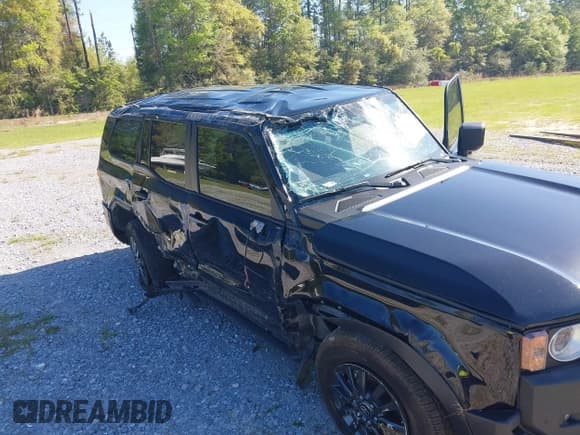 ✅ 2024 Toyota Land Cruiser • VIN: JTEABFAJ2RK013130 • Lot: 42002397. Listed on IAAI with 19,749 mi. Free auction sales archive from the USA and detailed vehicle history report at DreamBid. Image 6.