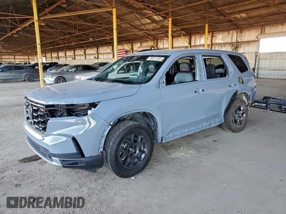 ✅ 2023 Honda Pilot TrailSport • VIN: 5FNYG1H65PB012489 • Lot: 95691385. Listed on Copart with 21,182 mi. Free auction sales archive from the USA and detailed vehicle history report at DreamBid. Image 1.