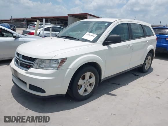 ✅ 2013 Dodge Journey Canada Value • VIN: 3C4PDCAB0DT594876 • Lot: 42569090. Listed on IAAI with 217,547 mi. Free auction sales archive from the USA and detailed vehicle history report at DreamBid. Image 2.