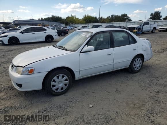 ✅ 2001 Toyota Corolla CE • VIN: 1NXBR12E71Z517721 • Lot: 80364505. Listed on Copart with 81,616 mi. Free auction sales archive from the USA and detailed vehicle history report at DreamBid. Image 1.