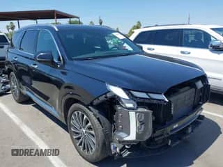 2024 Hyundai Palisade Calligraphy z VIN KM8R7DGE1RU697093, wystawiony jako IAAI lot #42746562 z przebiegiem 18 398 mil mil oraz . Historia ofert i sprzedaży dostępna na DreamBid. Obrazek 1.