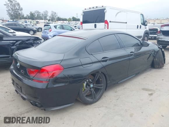✅ 2014 BMW M6 • VIN: WBS6C9C57ED467275 • Lot: 42787711. Listed on IAAI with 105,158 mi. Free auction sales archive from the USA and detailed vehicle history report at DreamBid. Image 4.