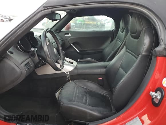 ✅ 2009 Saturn Sky • VIN: 1G8MN35B79Y103875 • Лот: 74669844. Опубликован ранее на Copart с пробегом Не указан. Бесплатный доступ к архиву аукционных продаж из США и подробный отчёт об истории автомобиля на DreamBid. Изображение 7.