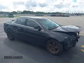 2012 Chevrolet Malibu 1LS z VIN 1G1ZB5E04CF296903, wystawiony jako IAAI lot #43410779 z przebiegiem 141 987 mil mil oraz . Historia ofert i sprzedaży dostępna na DreamBid. Obrazek 1.