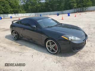 2008 Hyundai Tiburon GT с VIN KMHHN66F88U289728, выставлен на аукционе Copart как лот 62371395 с пробегом 153 660 миль миль и Чистый • Clean title. История ставок и продаж доступна на DreamBid. Изображение 4.