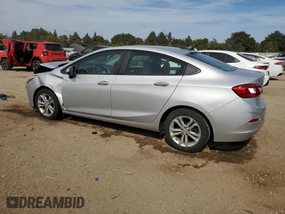 ✅ 2019 Chevrolet Cruze LS • VIN: 1G1BC5SM0K7138783 • Lot: 84916275. Listed on Copart with 145,810 mi. Free auction sales archive from the USA and detailed vehicle history report at DreamBid. Image 2.