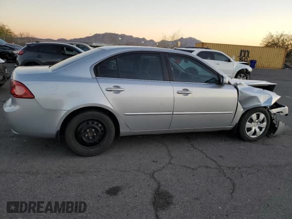 ✅ 2006 Kia Optima LX • VIN: KNAGE123X65026238 • Лот: 80925734. Опубликован ранее на Copart с пробегом 170 489 миль. Бесплатный доступ к архиву аукционных продаж из США и подробный отчёт об истории автомобиля на DreamBid. Изображение 3.