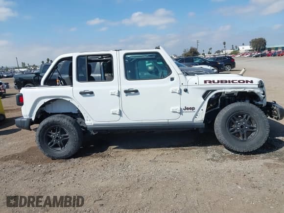 ✅ 2023 Jeep Wrangler Rubicon • VIN: 1C4HJXFG1PW600353 • Lot: 43338003. Listed on IAAI with 26,306 mi. Free auction sales archive from the USA and detailed vehicle history report at DreamBid. Image 13.