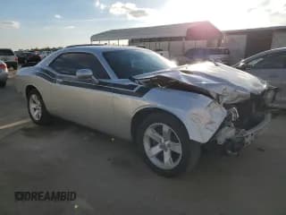 ✅ 2012 Dodge Challenger SXT • VIN: 2C3CDYAG7CH181159 • Lot: 78551424. Wystawiony na Copart z przebiegiem 118 327 mil. Bezpłatny archiwum sprzedaży aukcyjnych z USA i szczegółowy raport historii pojazdu na DreamBid. Zdjęcie 4.