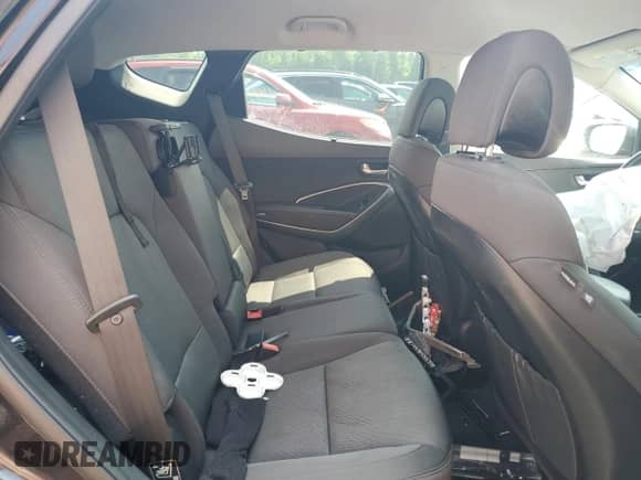 2018 Hyundai Santa Fe 2.4L z VIN 5XYZU3LB3JG546295, wystawiony jako Copart lot #64396365 z przebiegiem 112 822 mil mil oraz Szkoda całkowita • Salvage title. Historia ofert i sprzedaży dostępna na DreamBid. Obrazek 11.