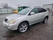 ✅ 2007 Lexus RX 400h • VIN: JTJGW31U272003252 • Lot: 93974385. Wystawiony na Copart z przebiegiem 249 080 mil. Bezpłatny archiwum sprzedaży aukcyjnych z USA i szczegółowy raport historii pojazdu na DreamBid. Zdjęcie 1.