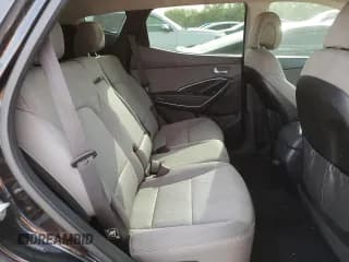 ✅ 2018 Hyundai Santa Fe 2.4L • VIN: 5NMZUDLB1JH063089 • Лот: 57906162. Опубликован ранее на Copart с пробегом 83 722 миль. Бесплатный доступ к архиву аукционных продаж из США и подробный отчёт об истории автомобиля на DreamBid. Изображение 6.