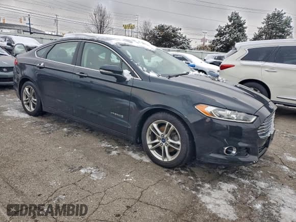 ✅ 2015 Ford Fusion Titanium Hybrid • VIN: 3FA6P0RU6FR179817 • Lot: 95251945. Wystawiony na Copart z przebiegiem 115 636 mil. Bezpłatny archiwum sprzedaży aukcyjnych z USA i szczegółowy raport historii pojazdu na DreamBid. Zdjęcie 4.