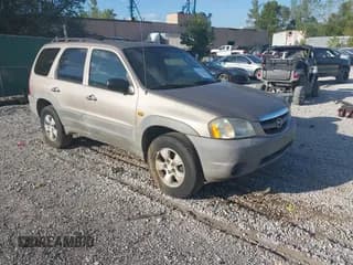 ✅ 2001 Mazda Tribute • VIN: 4F2YU06141KM46567 • Lot: 43279639. Listed on IAAI with 183,757 mi. Free auction sales archive from the USA and detailed vehicle history report at DreamBid. Image 1.