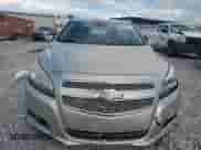 2013 Chevrolet Malibu LTZ z VIN 1G11H5SAXDF277489, wystawiony jako Copart lot #84701695 z przebiegiem 124 823 mil mil oraz Szkoda całkowita • Salvage title. Historia ofert i sprzedaży dostępna na DreamBid. Obrazek 5.