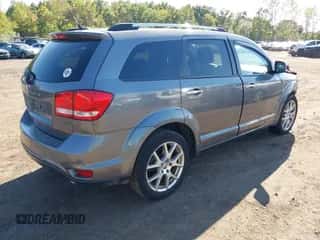 2013 Dodge Journey Crew z VIN 3C4PDDDG2DT568793, wystawiony jako IAAI lot #43265102 z przebiegiem 108 285 mil mil oraz . Historia ofert i sprzedaży dostępna na DreamBid. Obrazek 4.