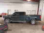 2018 Chevrolet Silverado 1500 LT z VIN 3GCUKREC0JG519095, wystawiony jako IAAI lot #43271594 z przebiegiem 108 548 mil mil oraz . Historia ofert i sprzedaży dostępna na DreamBid. Obrazek 14.