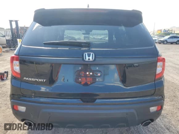 ✅ 2021 Honda Passport EX-L • VIN: 5FNYF7H55MB005616 • Lot: 61044605. Listed on Copart with 44,443 mi. Free auction sales archive from the USA and detailed vehicle history report at DreamBid. Image 6.