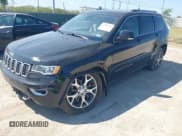 ✅ 2018 Jeep Grand Cherokee Limited • VIN: 1C4RJEBGXJC239244 • Lot: 42960286. Listed on IAAI with 107,933 mi. Free auction sales archive from the USA and detailed vehicle history report at DreamBid. Image 2.