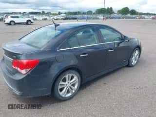 2011 Chevrolet Cruze LTZ z VIN 1G1PH5S97B7290692, wystawiony jako IAAI lot #42998701 z przebiegiem 202 956 mil mil oraz . Historia ofert i sprzedaży dostępna na DreamBid. Obrazek 4.