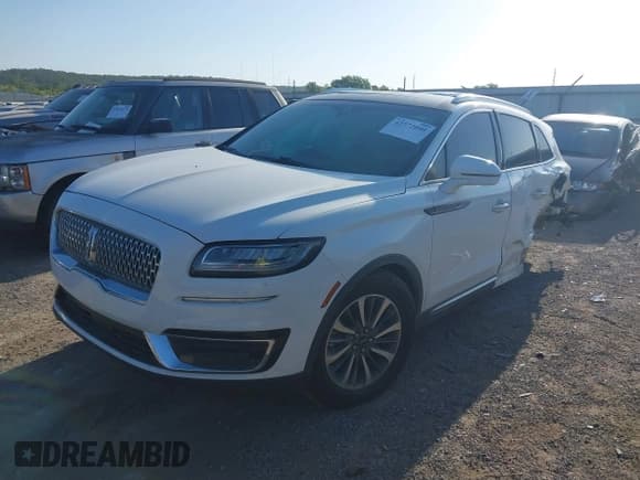 ✅ 2020 Lincoln Nautilus Reserve • VIN: 2LMPJ6K90LBL26247 • Lot: 42772040. Wystawiony na IAAI z przebiegiem 59 343 mil. Bezpłatny archiwum sprzedaży aukcyjnych z USA i szczegółowy raport historii pojazdu na DreamBid. Zdjęcie 23.