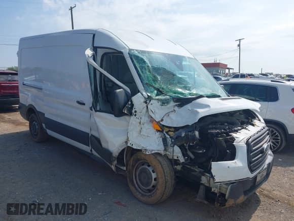 ✅ 2016 Ford Transit Cargo • VIN: 1FTYR2CM6GKA55411 • Lot: 42582896. Listed on IAAI with 89,921 mi. Free auction sales archive from the USA and detailed vehicle history report at DreamBid. Image 1.