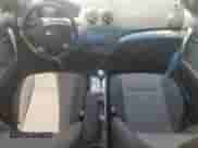 2009 Chevrolet Aveo 1LT with VIN KL1TD66E09B338773, listed as a Copart auction lot 52575765 with 102,617 mi miles and Salvage title. Bid and sale history available at DreamBid. Image 8.