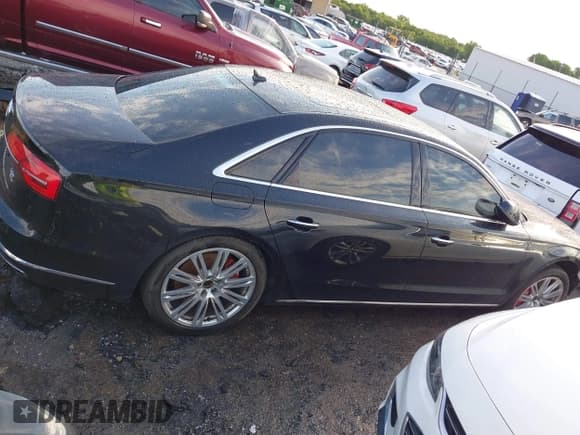 ✅ 2015 Audi A8 4.0T • VIN: WAU32AFD6FN022648 • Лот: 42358142. Опубликован ранее на IAAI с пробегом 103 416 миль. Бесплатный доступ к архиву аукционных продаж из США и подробный отчёт об истории автомобиля на DreamBid. Изображение 14.