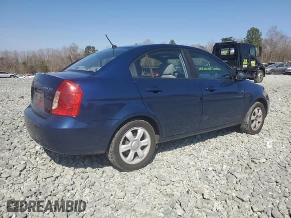 ✅ 2006 Hyundai Accent GLS • VIN: KMHCN46C56U042703 • Лот: 48938265. Опубликован ранее на Copart с пробегом 167 661 миль. Бесплатный доступ к архиву аукционных продаж из США и подробный отчёт об истории автомобиля на DreamBid. Изображение 3.