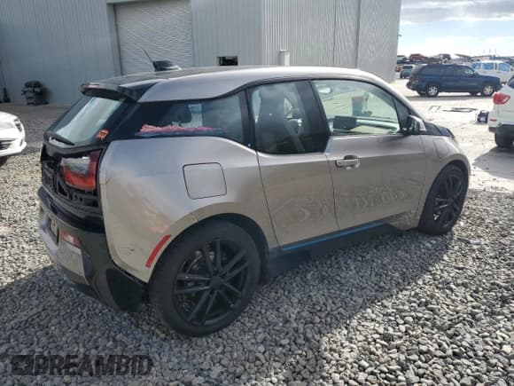 ✅ 2014 BMW i3 • VIN: WBY1Z4C5XEV273318 • Lot: 84774655. Listed on Copart with 74,464 mi. Free auction sales archive from the USA and detailed vehicle history report at DreamBid. Image 3.