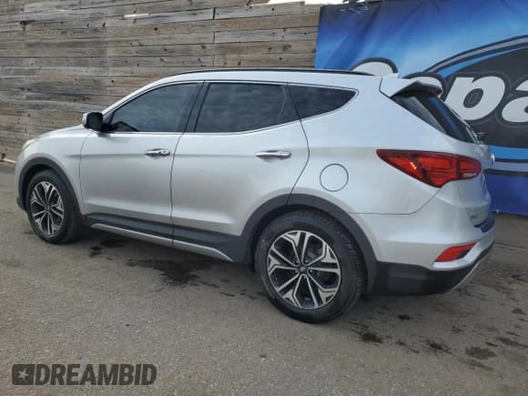 ✅ 2017 Hyundai Santa Fe Ultimate • VIN: 5XYZWDLA2HG456640 • Lot: 91245465. Listed on Copart with 94,087 mi. Free auction sales archive from the USA and detailed vehicle history report at DreamBid. Image 2.