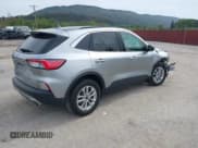 ✅ 2022 Ford Escape SE • VIN: 1FMCU9G62NUA42990 • Lot: 43327923. Listed on IAAI with 76,773 mi. Free auction sales archive from the USA and detailed vehicle history report at DreamBid. Image 4.