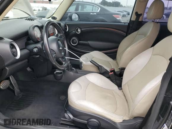 2012 MINI Hardtop S with VIN WMWSV3C52CTY17540, listed as a Copart auction lot 64137185 with 115,542 mi miles and Salvage title. Bid and sale history available at DreamBid. Image 7.