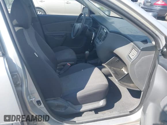 ✅ 2009 Kia Rio LX • VIN: KNADE223296459124 • Lot: 43130896. Wystawiony na IAAI z przebiegiem 129 998 mil. Bezpłatny archiwum sprzedaży aukcyjnych z USA i szczegółowy raport historii pojazdu na DreamBid. Zdjęcie 5.