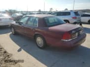 ✅ 2004 Ford Crown Victoria Standard • VIN: 2FAFP73W54X135518 • Lot: 72084114. Wystawiony na Copart z przebiegiem 145 716 mil. Bezpłatny archiwum sprzedaży aukcyjnych z USA i szczegółowy raport historii pojazdu na DreamBid. Zdjęcie 2.