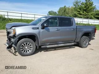 ✅ 2021 GMC Sierra 1500 AT4 • VIN: 1GTP9EED5MZ299046 • Лот: 71597315. Опубликован ранее на Copart с пробегом 77 978 миль. Бесплатный доступ к архиву аукционных продаж из США и подробный отчёт об истории автомобиля на DreamBid. Изображение 1.