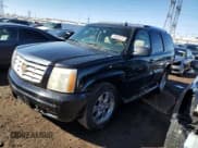 ✅ 2006 Cadillac Escalade • VIN: 1GYEK63NX6R145359 • Lot: 46592015. Listed on Copart with 223,062 mi. Free auction sales archive from the USA and detailed vehicle history report at DreamBid. Image 1.