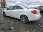 ✅ 2009 Pontiac G6 1SA • VIN: 1G2ZG57B594186734 • Lot: 90953235. Listed on Copart with 168,398 mi. Free auction sales archive from the USA and detailed vehicle history report at DreamBid. Image 2.