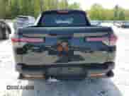 2025 Hyundai Santa Cruz SEL with VIN 5NTJBDDE9SH137120, listed as a Copart auction lot 56850295 with 1,693 mi miles and Salvage title. Bid and sale history available at DreamBid. Image 6.